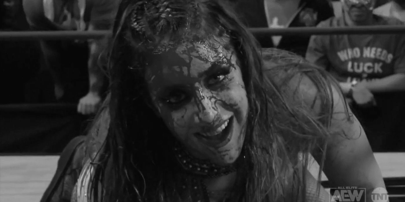 britt baker looking down the camera covered in blood