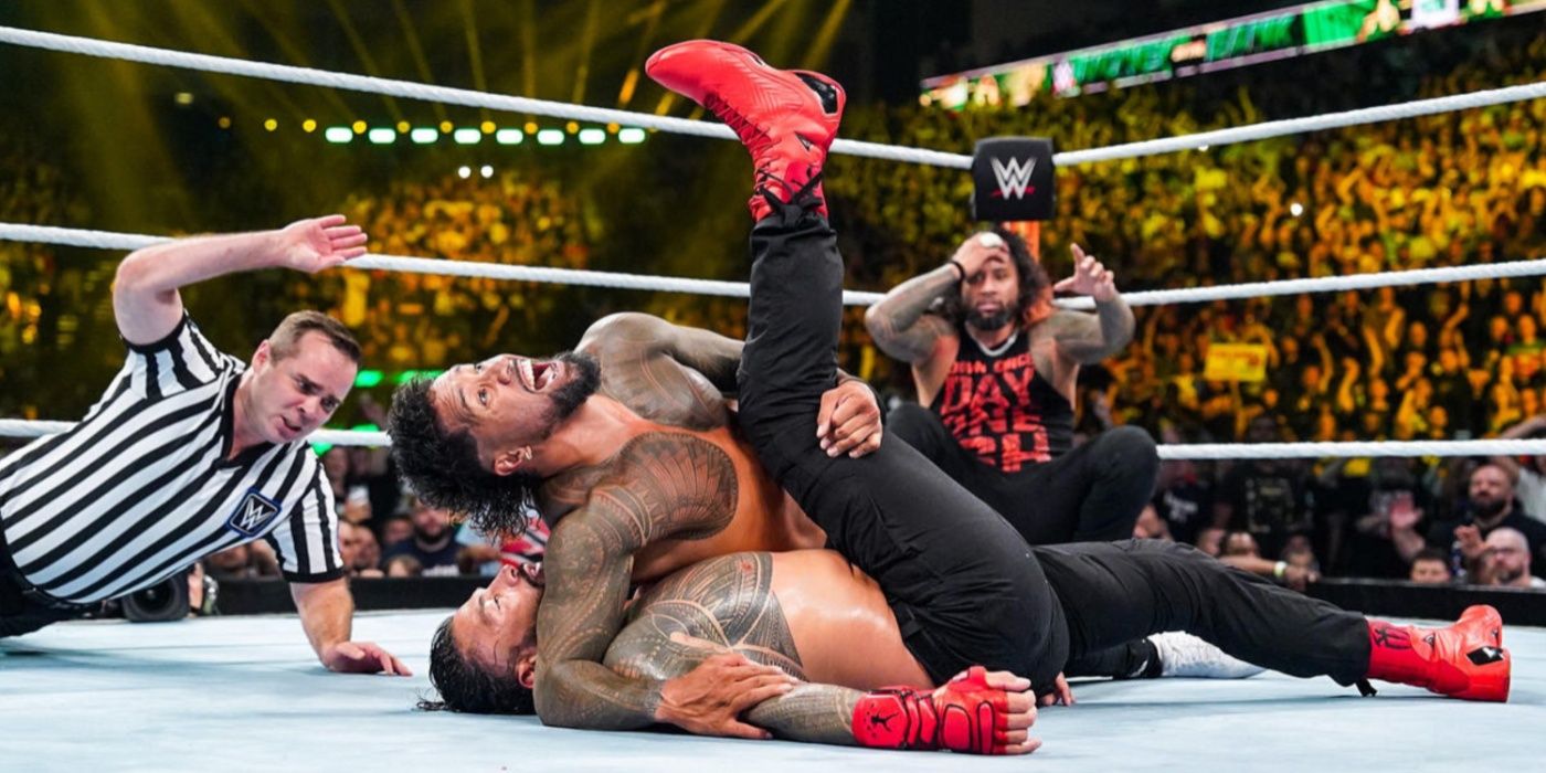 jey uso pinning roman reigns at money in the bank