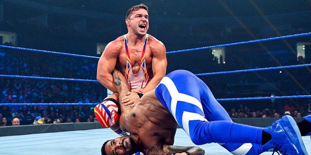 Chad Gable applying an armlock.