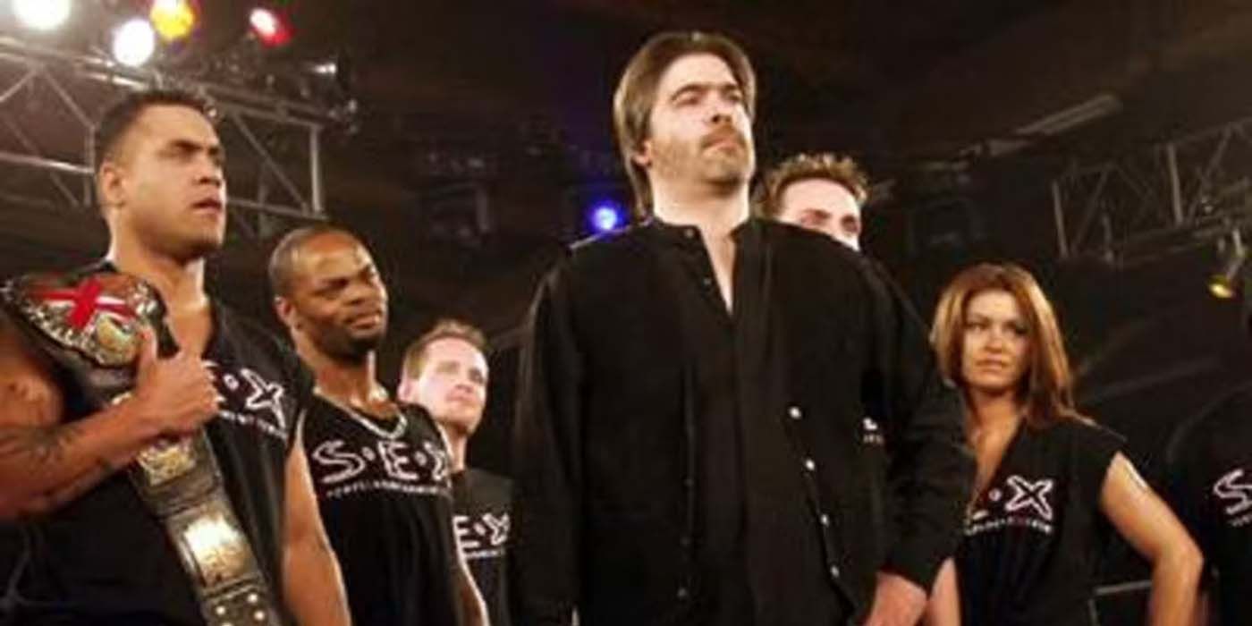 Sports Entertainment Xtreme (Vince Russo, Sonny Siaki, Elix Skipper, others) stand in the ring of a TNA show