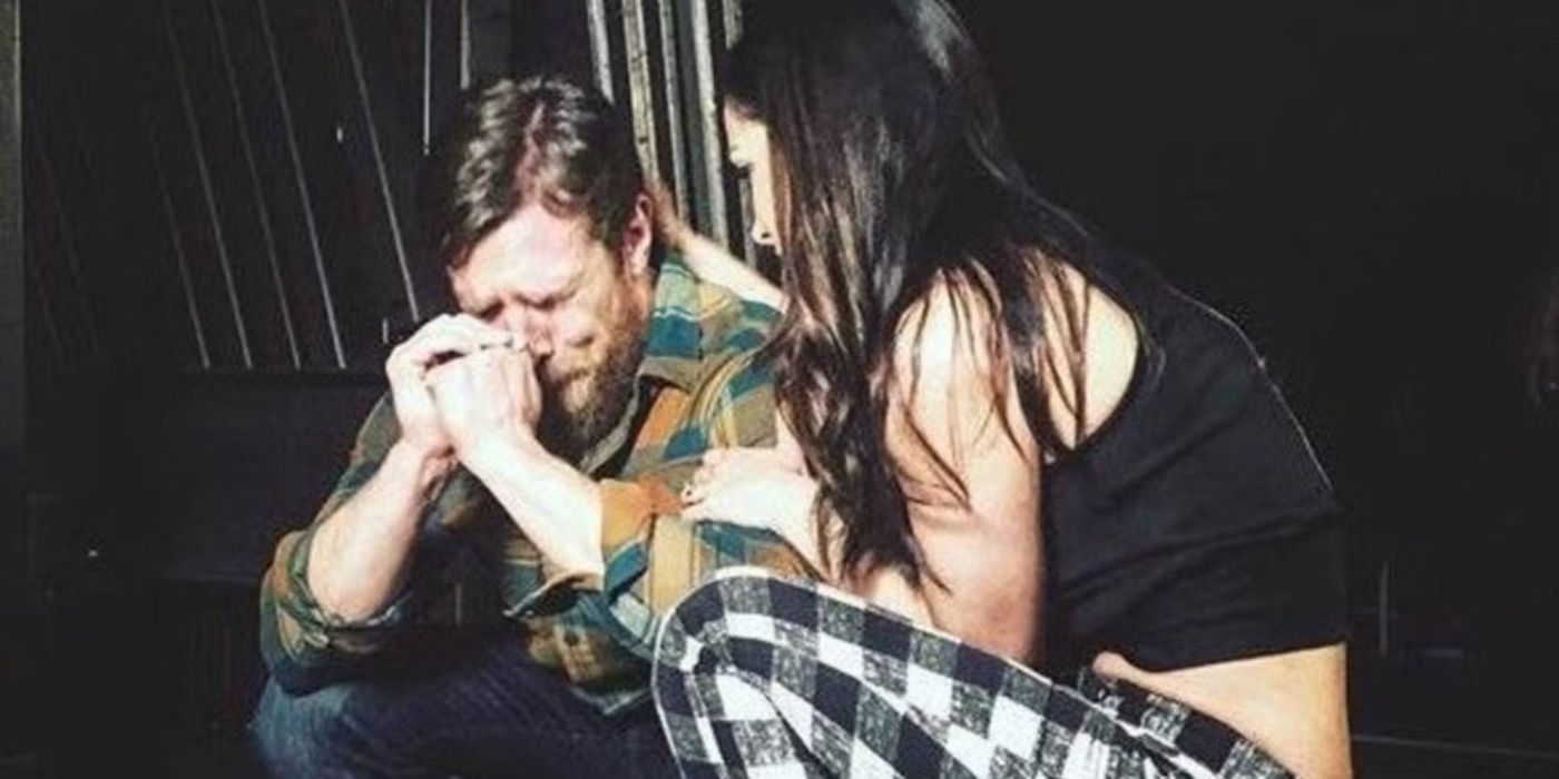 Brie Bella comforting a heartbroken Daniel Bryan