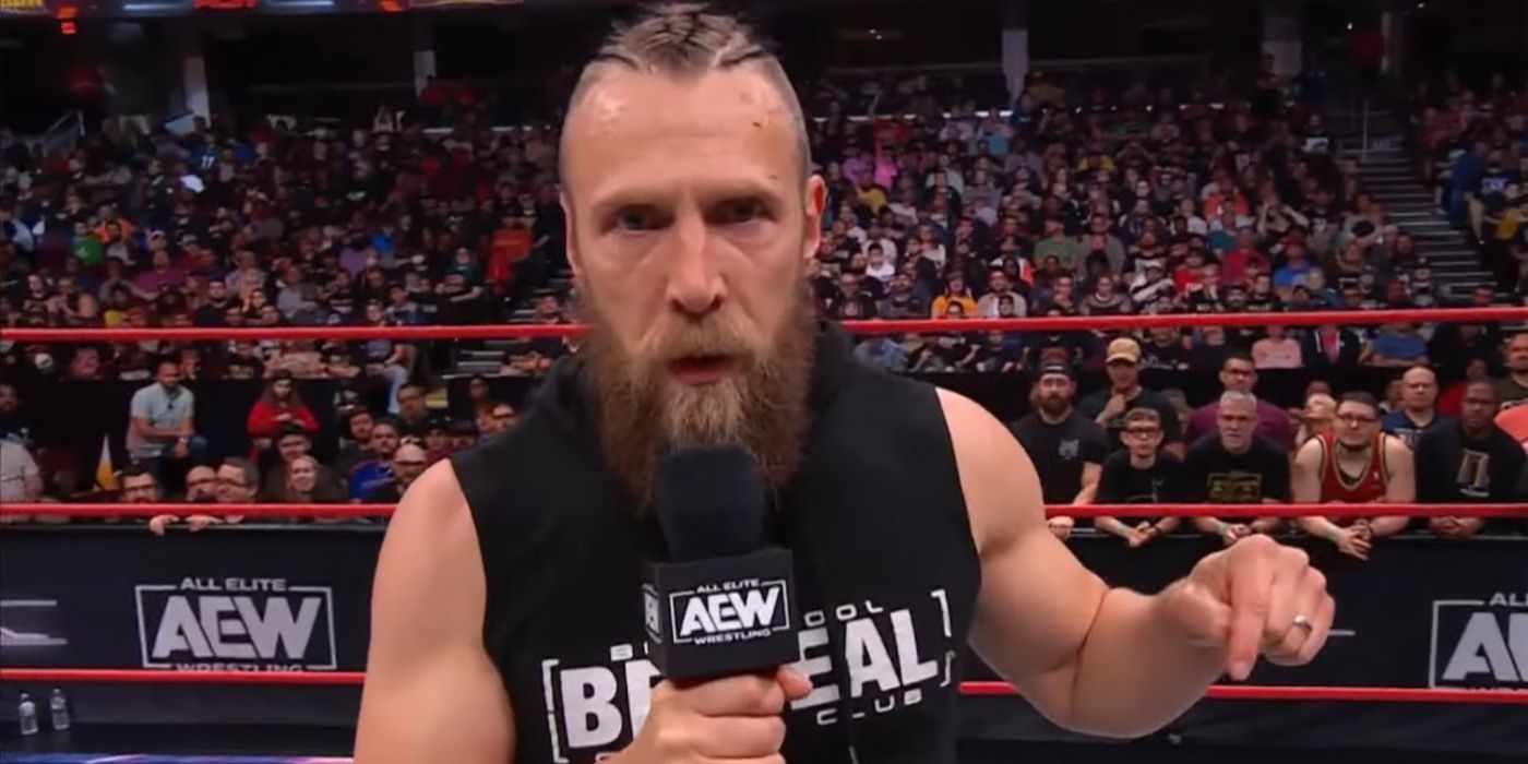 bryan danielson on the mic, looking down the camera