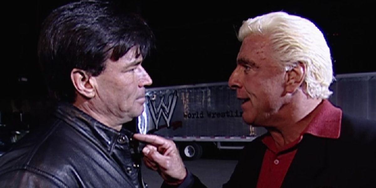 Ric Flair confronting Eric Bischoff. 