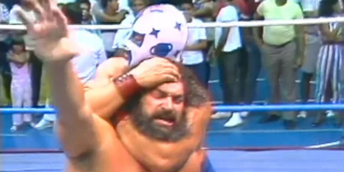 Invader 1 with a Sleeper on Bruiser Brody.