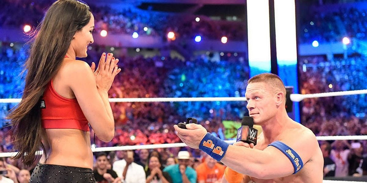 John Cena proposes to Nikki Bella.