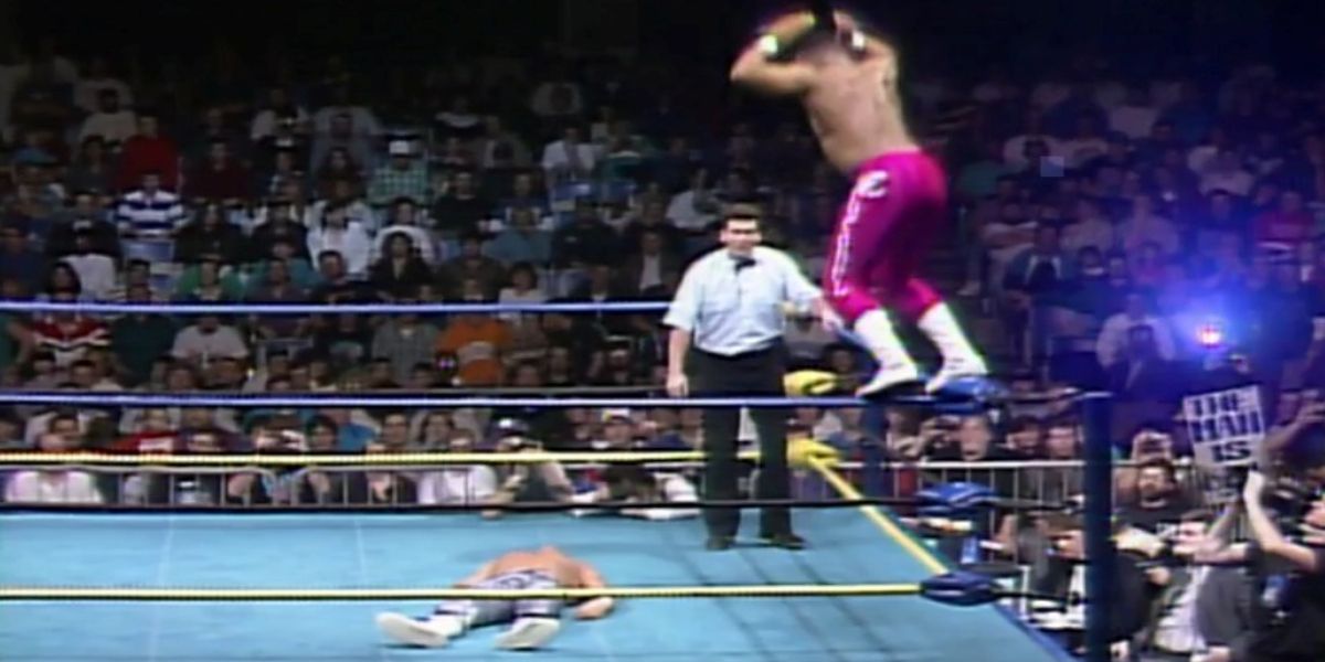 2-Cold-Scorpio-Flipping-Off-Top-Rope