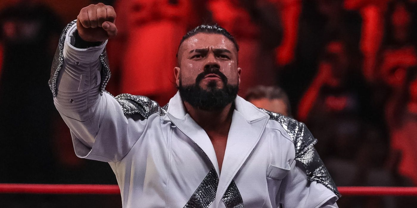 andrade el idolo with his fist in the air