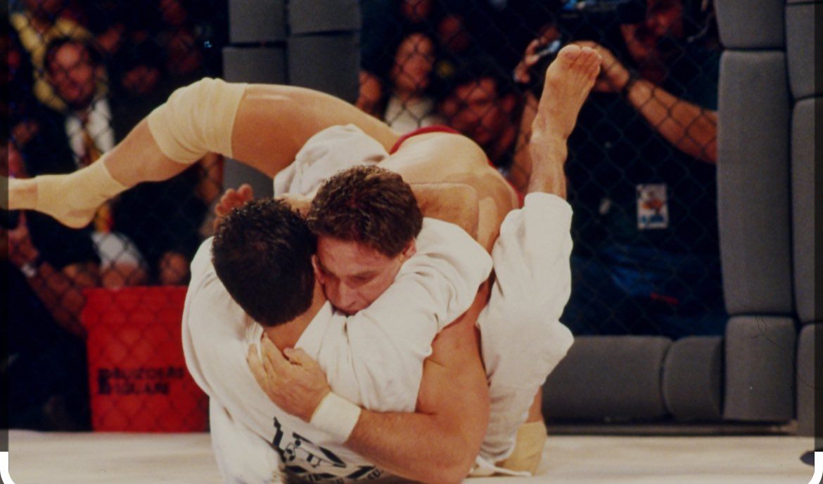 Feb 19, 2016; Houston, TX, USA; Ken Shamrock (blue gloves) lays on the mat during his fight against Royce Gracie 