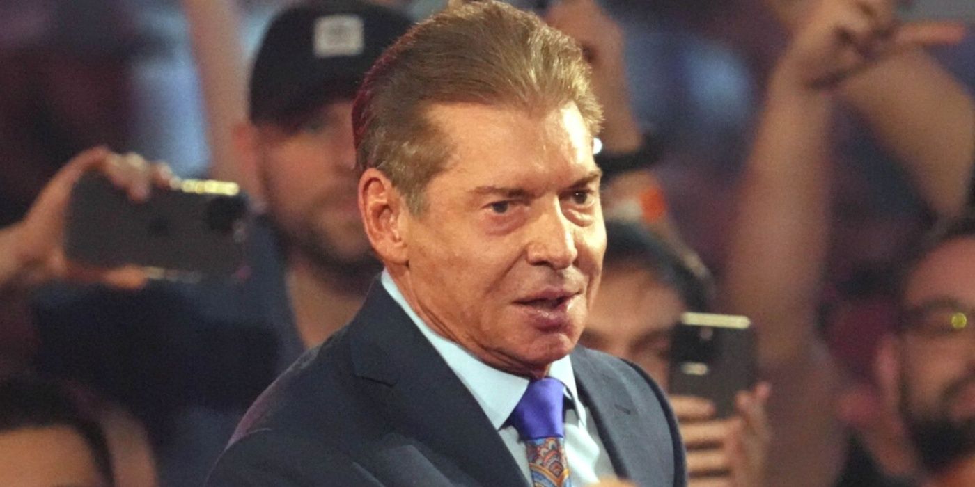 vince mcmahon in a crowd of people