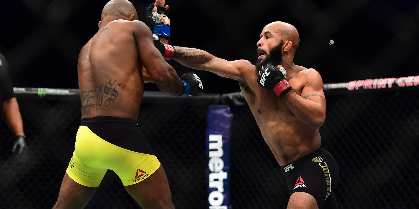 Demetrious Johnson punches Wilson Reis in the UFC
