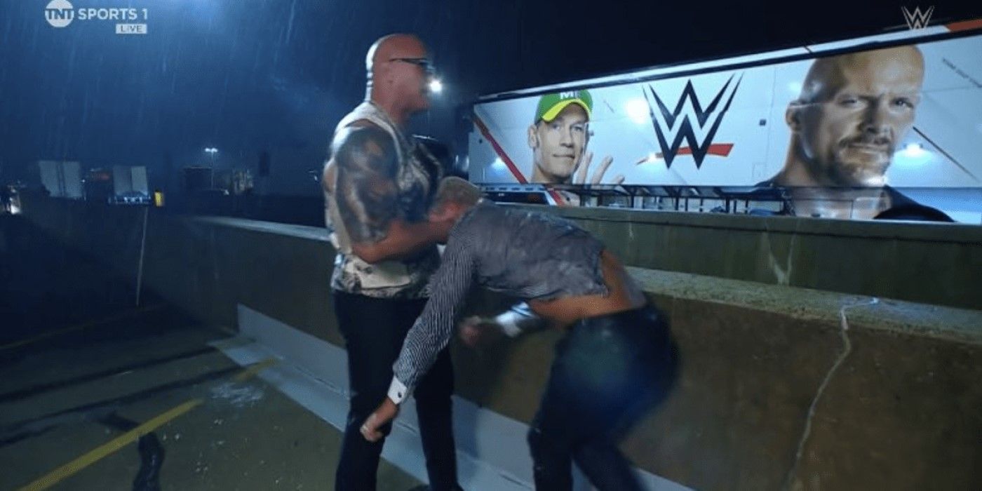 John Cena and Steve Austin on truck during The Rock beating up Cody Rhodes on WWE Raw.