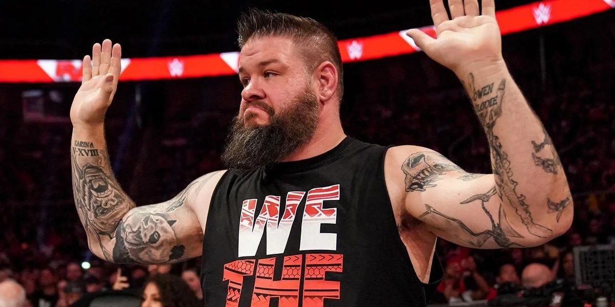 Kevin Owens with his hands up on WWE Raw