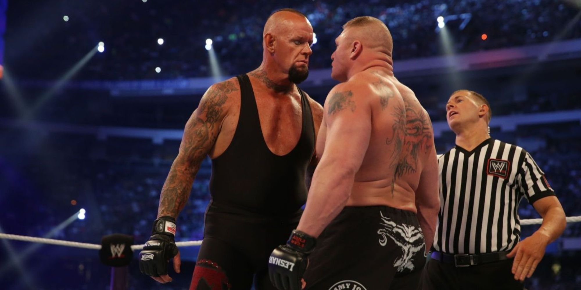 the undertaker squaring up to brock lesnar
