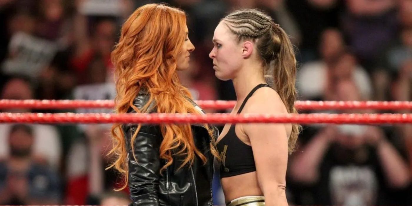 becky lynch and ronda rousey standing nose to nose