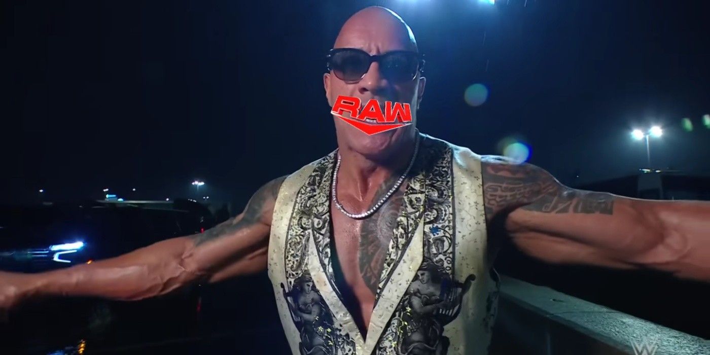the rock with a raw logo over his mouth