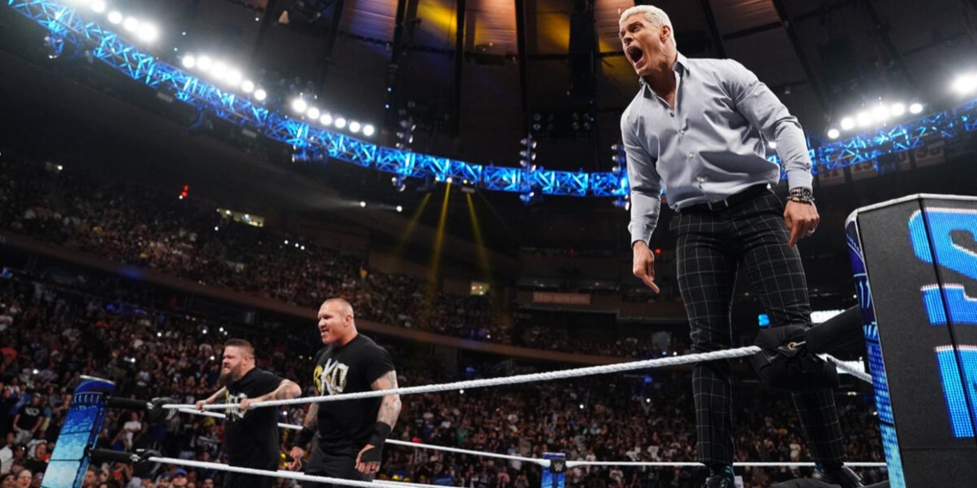 randy orton kevin owens and cody rhodes looking out of the ring