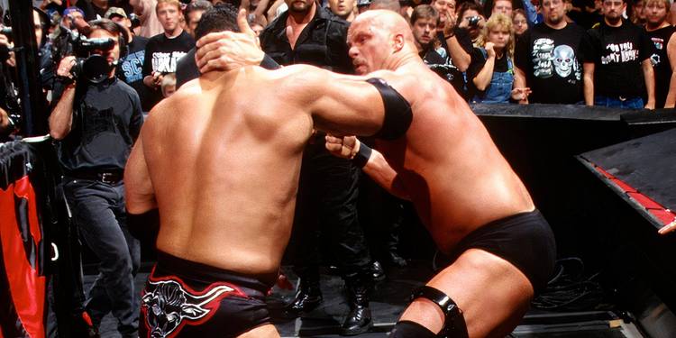 Steve Austin and The Rock brawling WWE RAW
