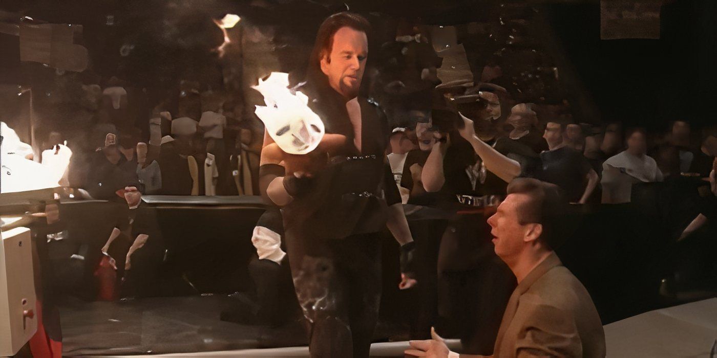 undertaker-gives-mr-mcmahon-the-burning-teddy-bear-of-stephanie-mcmahon.jpg