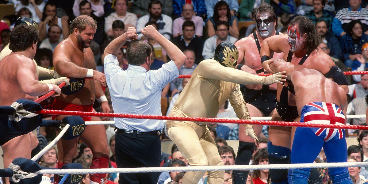 Demolition and Los Conquistadors work on The British Bulldog at WWF Survivor Series 1988