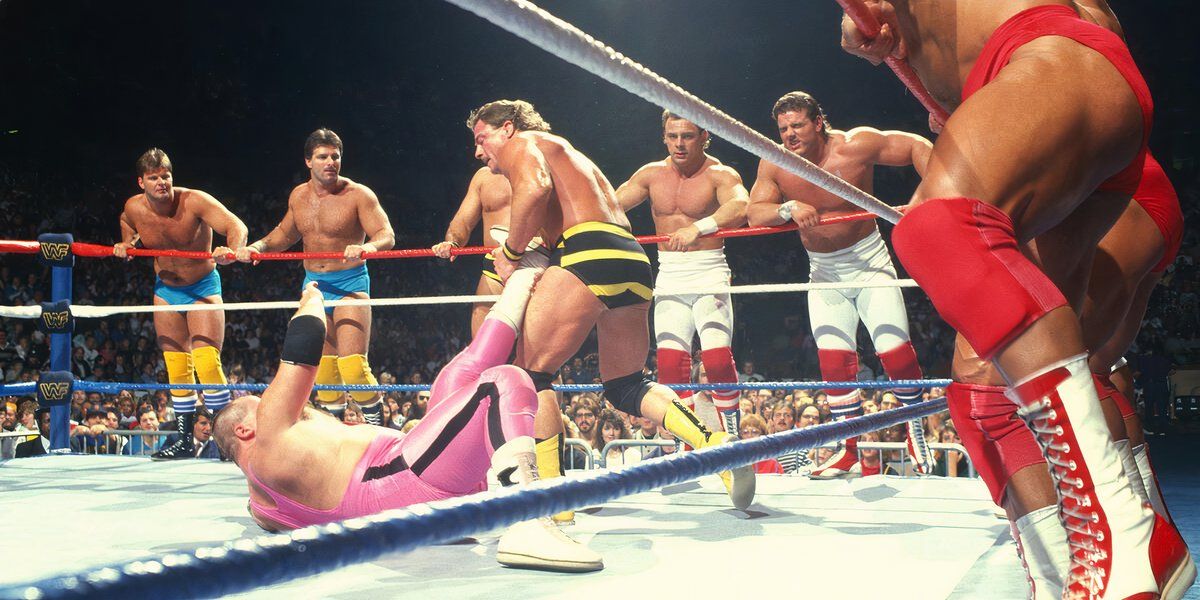 Jim Brunzell works Jim Neidhart's leg at WWF Survivor Series 1987