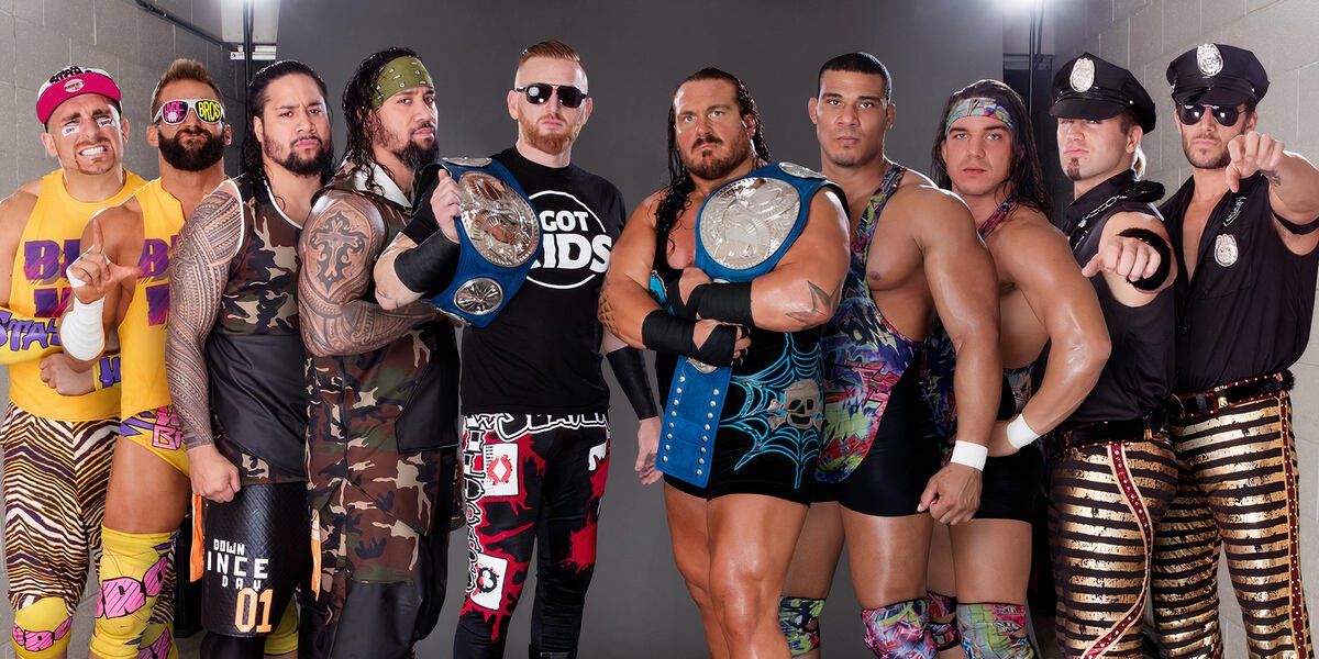 Team SmackDown's (The Hype Bros, The Usos, Heath Slater, Rhyno, American Alpha, and Breezango) promotional picture at WWE Survivor Series 2016