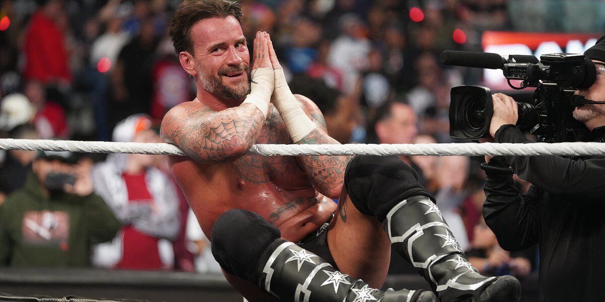 Cm punk makes the "Go to sleep" WWE RAW gesture