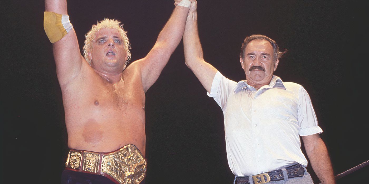 Dusty Rhodes with the WWE Championship