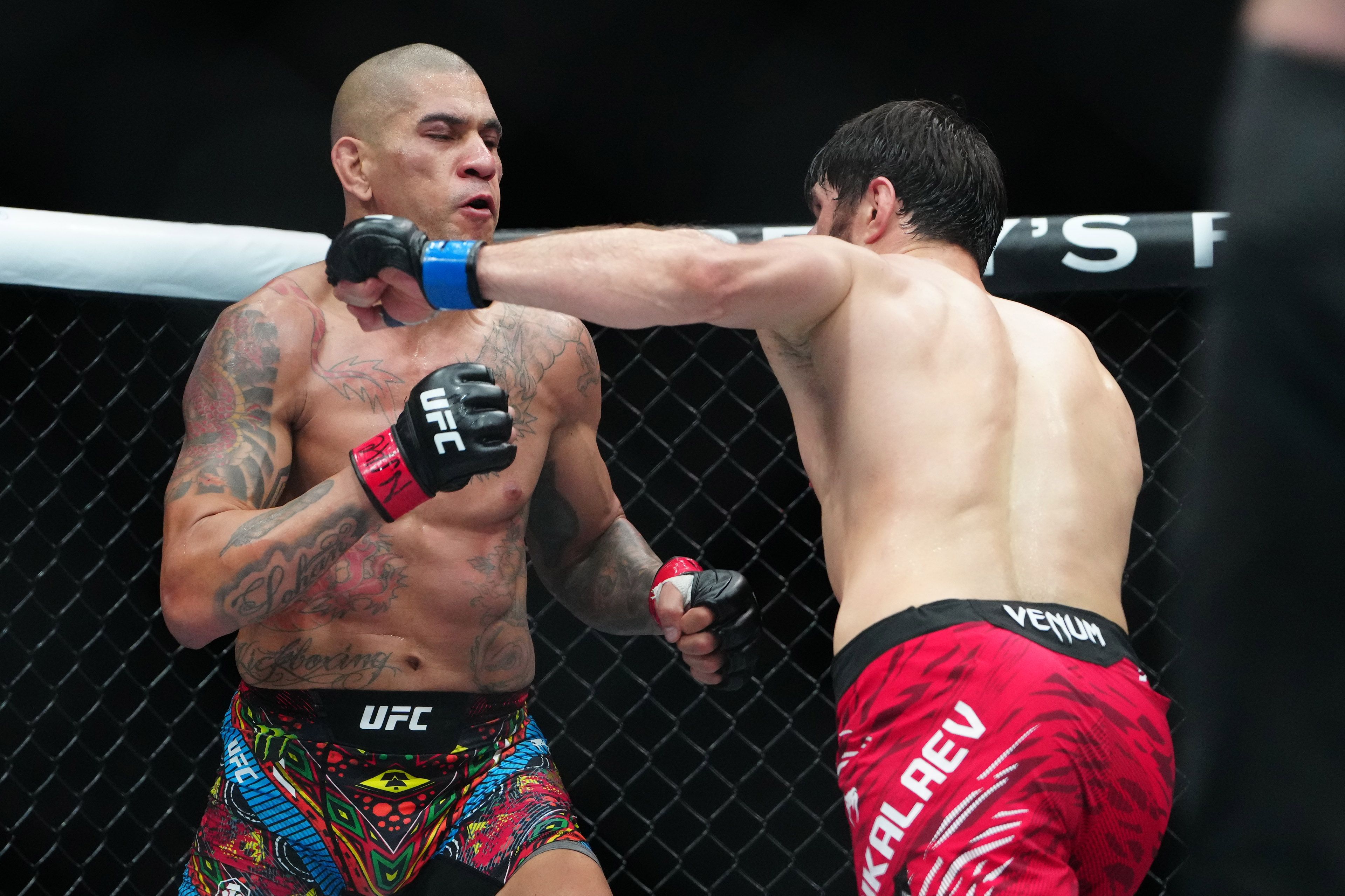 https://static0.thesportsterimages.com/wordpress/wp-content/uploads/2025/03/magomed-ankalaev-alex-periera-2.jpg