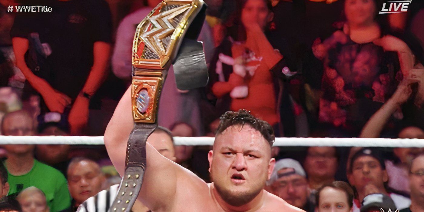 Samoa Joe with the WWE Championship