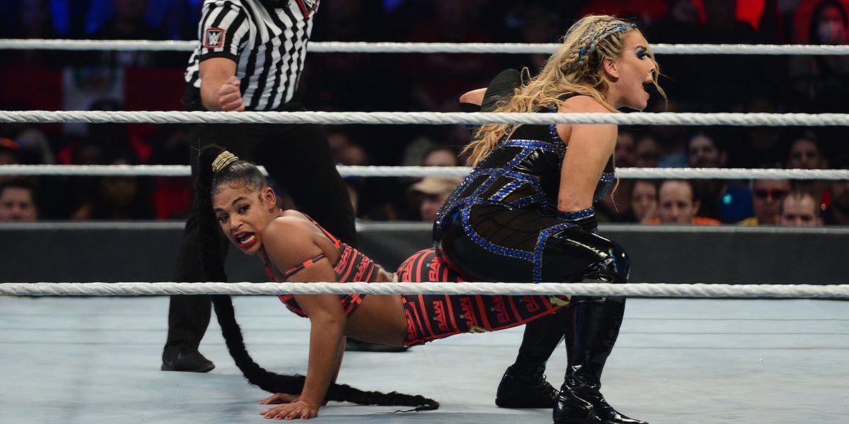 Natalya Applies Sharp Shooter to Bianca Bella in WWE Survivor Series 2021