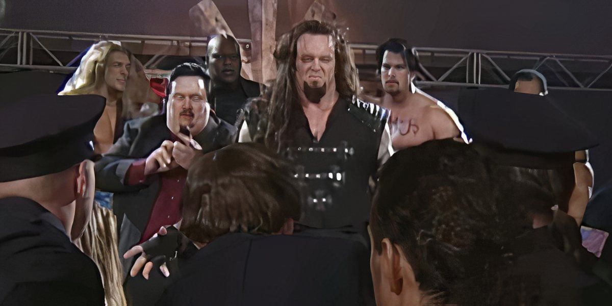 The Ministry of Darkness stands on the stage (WWF RAW, March 1999)
