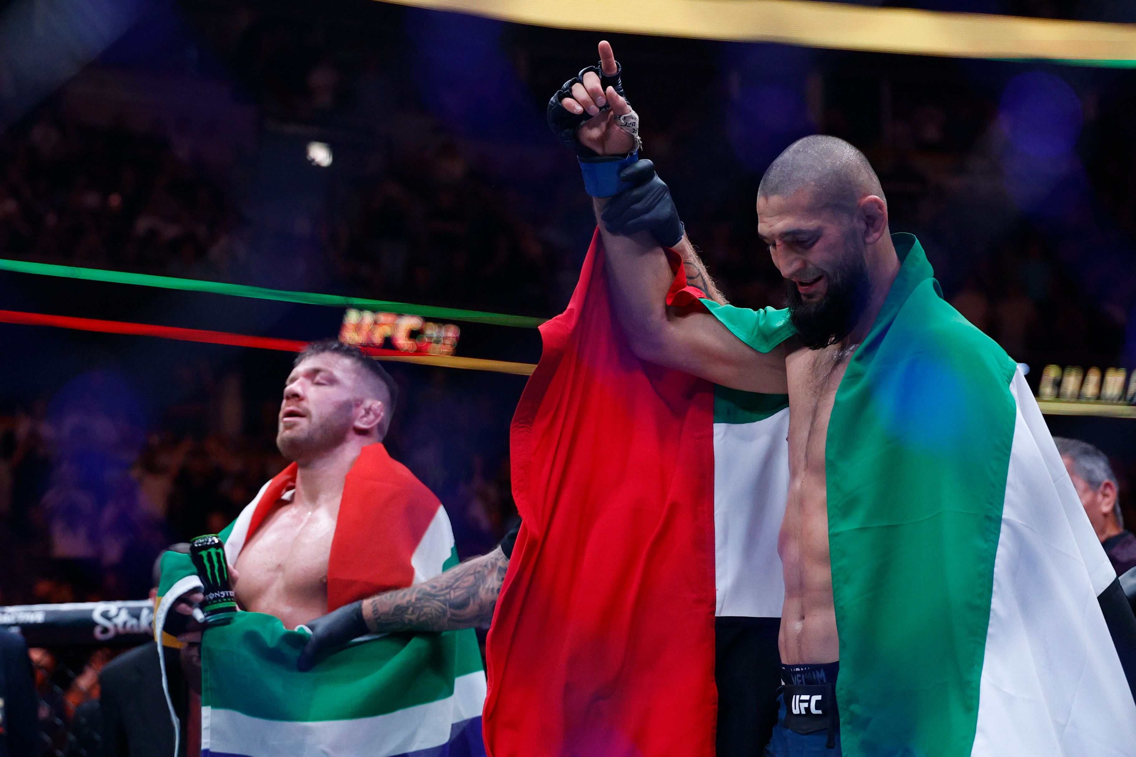 https://static0.thesportsterimages.com/wordpress/wp-content/uploads/2025/08/dricus-du-plessis-vs-khamzat-chimaev-post-fight.jpg