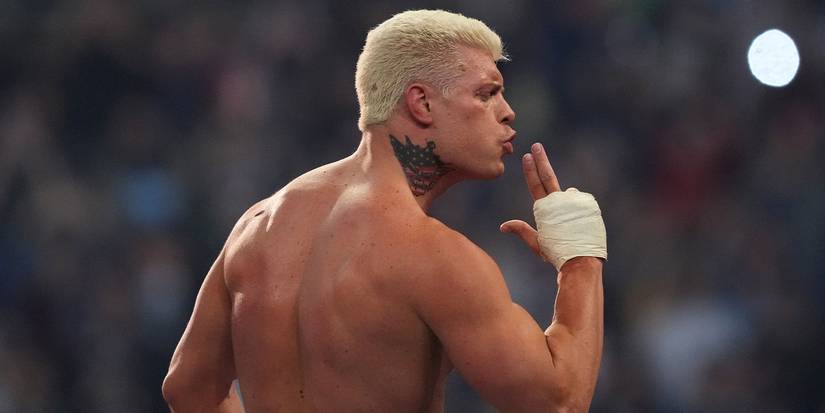 Cody Rhodes blowing out a finger gun