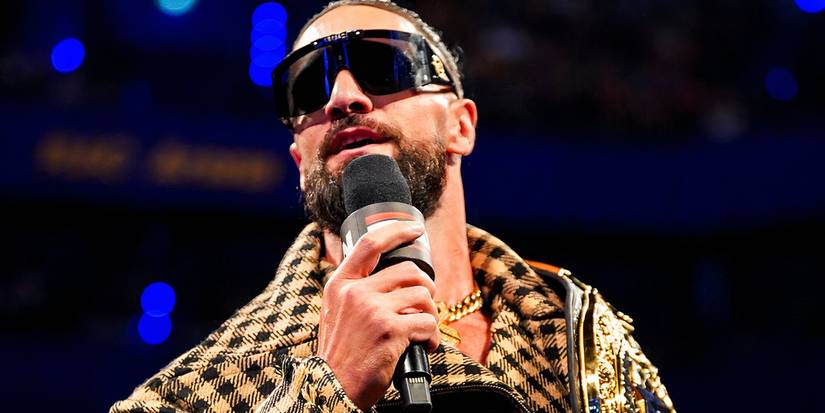 Seth Rollins gives a WWE Raw promo while wearing sunglasses