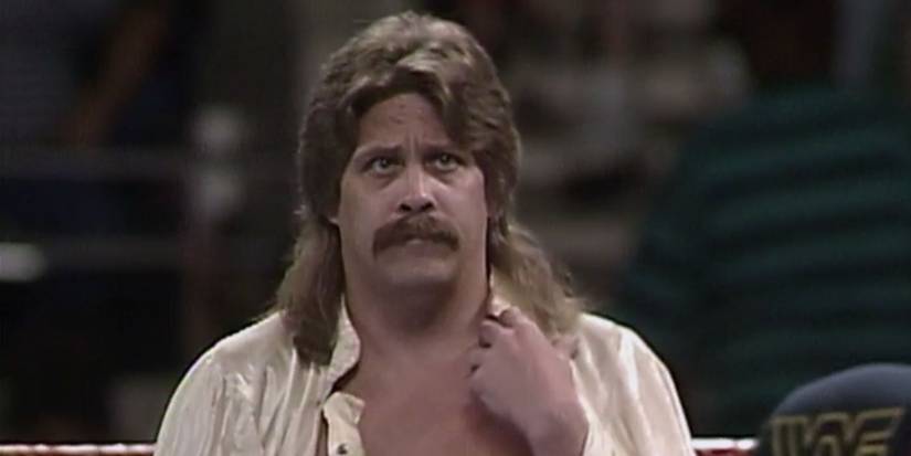 Ken Wayne standing in a WWE ring