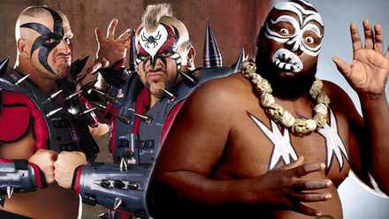 The Road Warriors posing for promotional pictures. Kamala posing with his hand up.