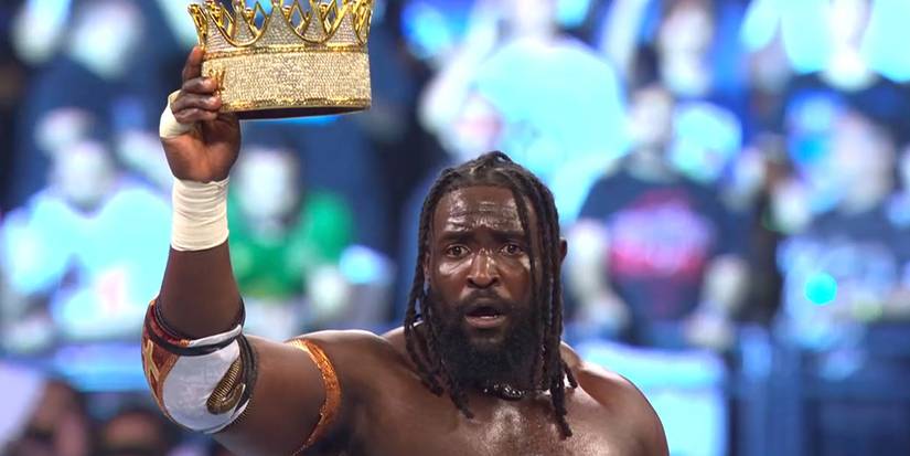 Oba Femi holding up the King of the Ring crown at Night of Champions